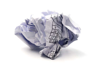 Crushed paper ball isolated on white background.の写真素材