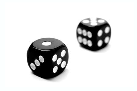Two Black Dice Games isolated on a white background.の写真素材