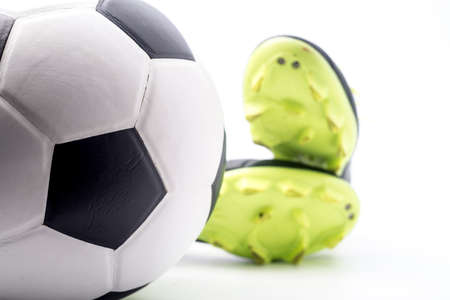 Football and a football shoes  isolated on white background.の写真素材