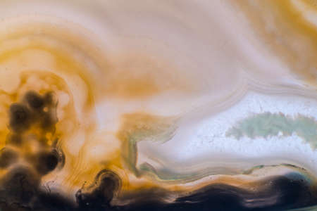 Close up of natural yellow agate crystal surface, yellow agate crystal cross section. abstract...