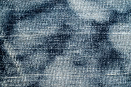 Close up of  blue denim jeans fabric texture background.の写真素材
