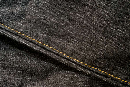 Close up of  blue denim jeans fabric texture background.の写真素材