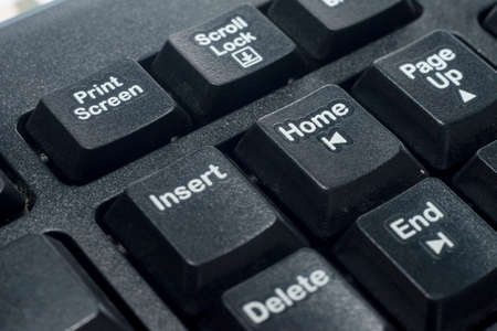 close-up home button on the computer keyboardの写真素材