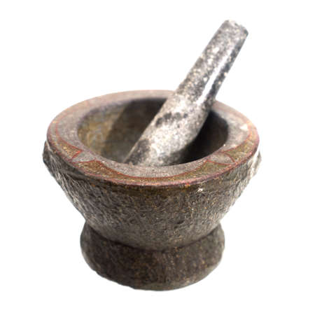 Stone mortar and pestle isolated on a white backgroundの写真素材
