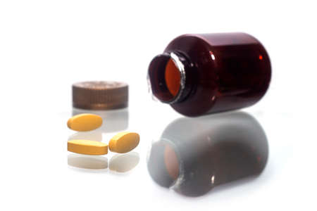 Pills Of Vitamin C Spilled Out Open Container