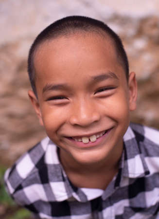 Portrait of a cute asia thai boy smiling