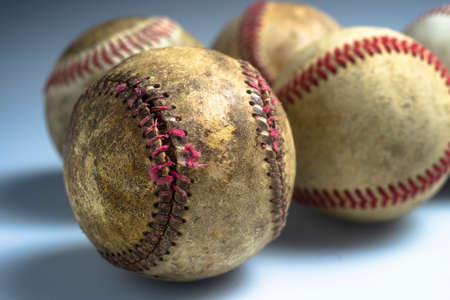 Close up old baseball isolated on a white background.の写真素材