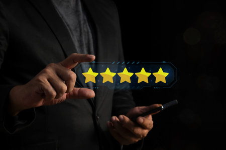 Customer hand hold five stars. Service rating, giving a five star rating. satisfaction concept.