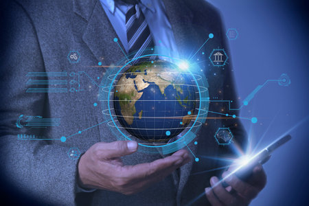 Businessman using smartphone and holding Global network connection, AI and internet of things on 6G network wireless systems concept. Big data analytics and business intelligenceの写真素材