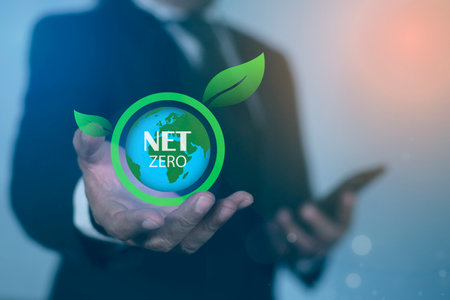 Business people holding to ESG ,eco green energy system icon. Net Zero and Carbon Neutral Concepts