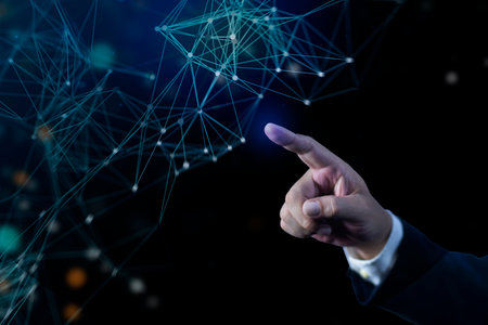 Businessman hand point to touch a point with in a complex system in a network connection. Global network connection concept. Network connection dots and lines.の写真素材