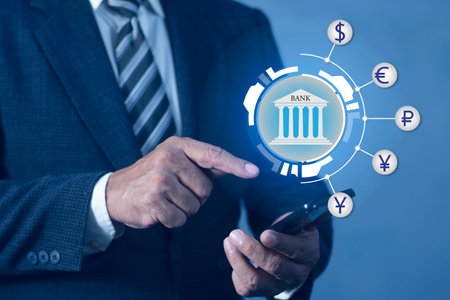 Businessman uses smartphone banking analysing stock market growth and making profit on currency converter exchange. financial and banking in global networking business concept.の写真素材