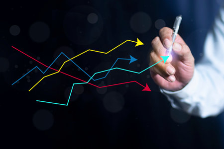 Businessman hand drawing a business chart, graph stock market indicator, business profit chart trade growth index economyon screen.の写真素材
