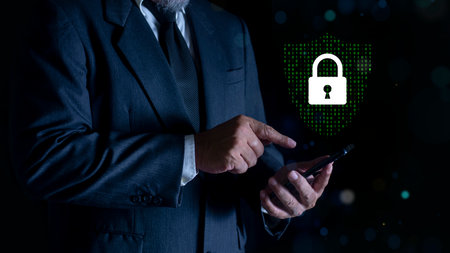 Businessman using Smartphone with Padlock icon and internet technology networking. protecting data...
