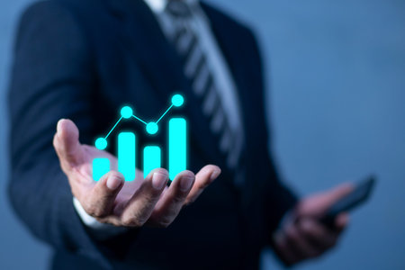 Bussinessman hand holding investment growth, financial performance and data analysis concept. Business growth and KPI analytics. Steps to successの写真素材