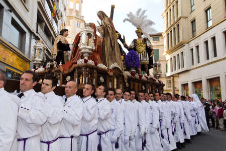 Malaga, Spain - April 17, 2011 - Bearers of religious images during processions in Holy Weekのeditorial素材