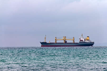 Cargo ship leaving portの写真素材