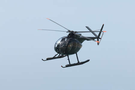 Hughes 369HM helicopter of the Spanish Navy in flightの写真素材