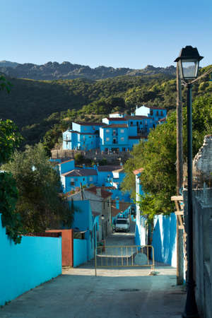 JUZCAR, SPAIN - CIRCA JUNE 2011: Alley of the village painted blue circa June 2011 in Malaga, Spain. The village was painted blue after Sony chose it for the world premiere of the new movie のeditorial素材