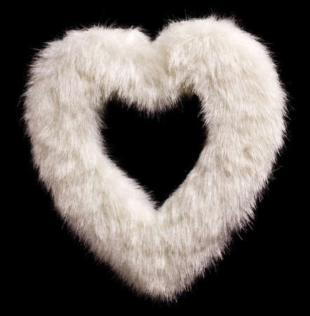 Furry white heart isolated on blackの写真素材
