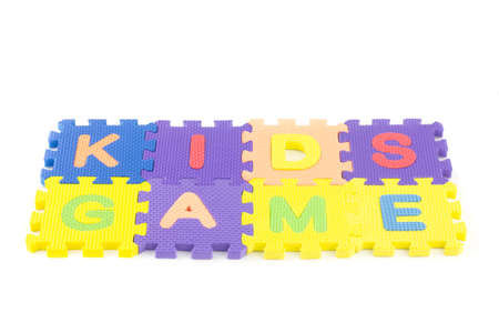 Colored puzzle pieces wit  Kids Game  letters isolated on white background