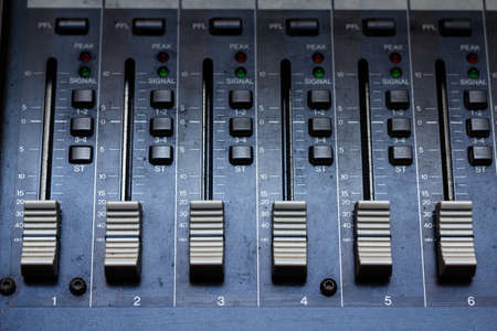 Audio mixing console in a recording studio  Faders of a sound mixerの写真素材