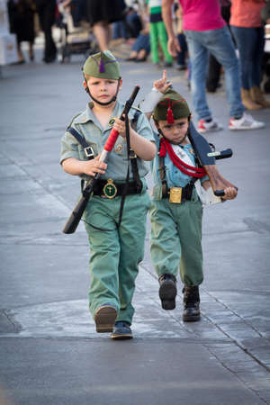 MALAGA, SPAIN - APRIL 18: Unidentified children dressed as spanish legionnaires marching during an Easter parade on April 18, 2014 in Alhaurin de la Torre, Malaga, Spain.のeditorial素材