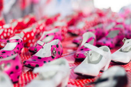 Typical spanish gipsy shoes on their boxes. Shallow depth of field.の写真素材