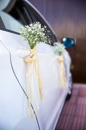 Wedding car decorated with flowersの写真素材