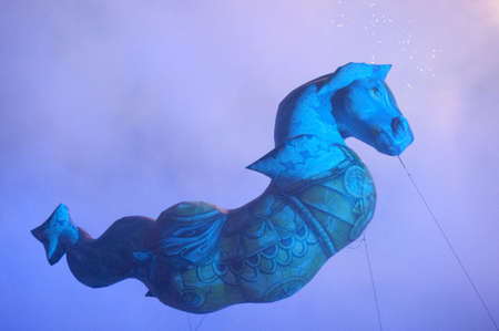 Castle of Versailles, France - June 24 2011 / The Venetian Festivities on the Grand Canal : Dragon Apollon flying above the Grand Canalのeditorial素材