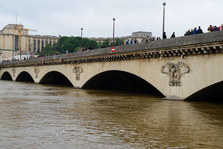 PARIS, FRANCE - JUNE 4: Paris flood with high water on June 4, 2016 in Paris, France. Iena bridge  eagleのeditorial素材