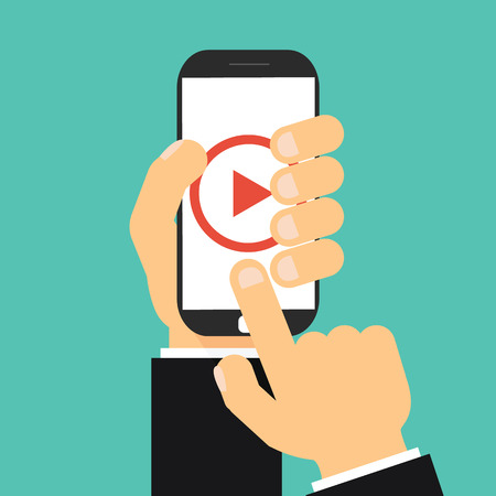 Businessman hand holding smartphone with video player on the screen. Movie app concept.のイラスト素材