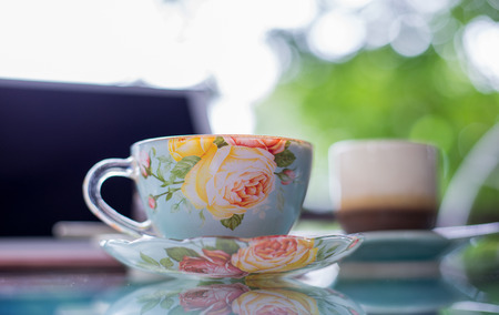 Beautiful cup of hot drink with coffee in coffee shop.の写真素材