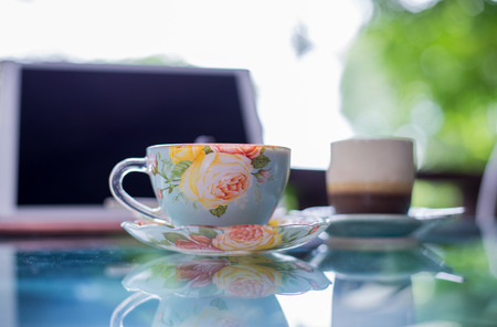 Beautiful cup of hot drink with coffee in coffee shop.の写真素材
