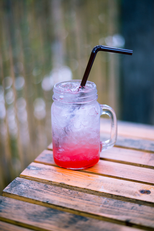 Strawberry and soda in a glass, Eating healthy with sparkling strawberryの写真素材