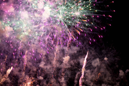 Fireworks. Stars and shiny fireworks on red background.の写真素材