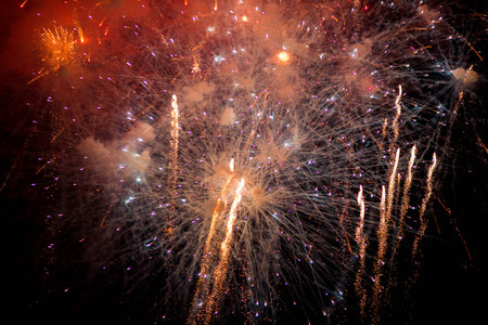 Fireworks. Stars and shiny fireworks on red background.