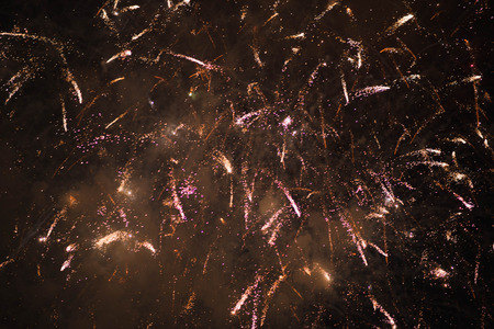 Fireworks. Stars and shiny fireworks on red background.の写真素材