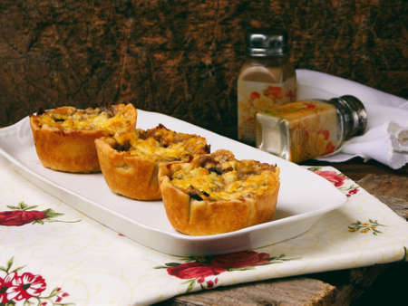 Baked mushroom casserolle with cheese in dough, french julienne. selective focusの写真素材