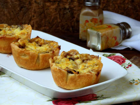 Baked mushroom casserolle with cheese in dough, french julienne. selective focusの写真素材