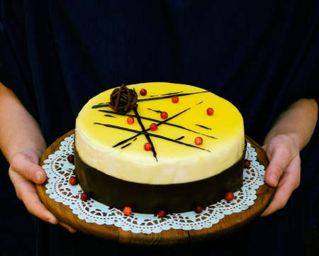 Cake with cheese cream mousse and caramel-coated mirror glaze. Niigata cake.  selective focus.