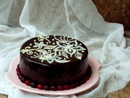 homemade chocolate cake covered a mirror coating