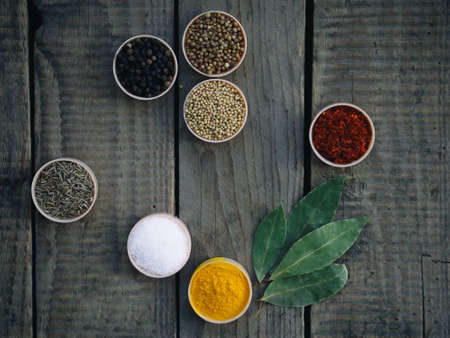 spices on a wooden background. Mix for barbecue.の写真素材