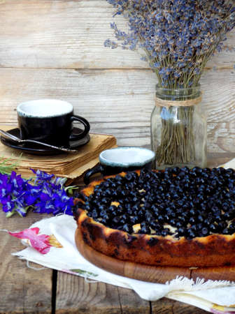 Homemade blueberries pie on a wooden background.の写真素材