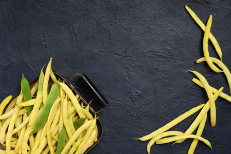 Fresh bio organic asparagus beans on metal plate. Healthy food. Copy space. Mockup for menu or recipeの写真素材