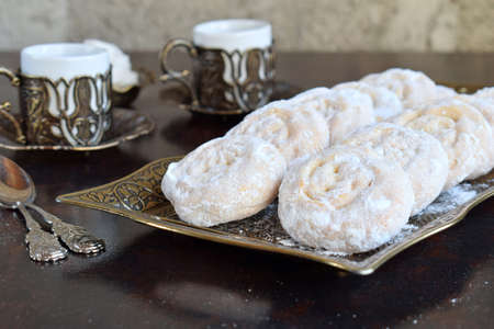 Sesame shortbread with date stuffing. Middle Eastern cookies. Eid and Ramadan Dates Sweets. Kahk....