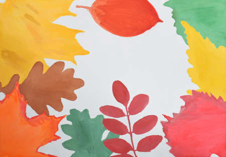 Children's drawing: autumn frame of yellow red, green, orange leaves. Hello Autumn concept. Copy spaceの写真素材