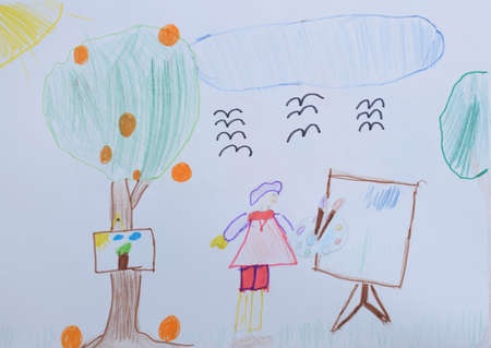 Children's drawing: little girl draws the sky, trees in park. Children drawing conceptの写真素材