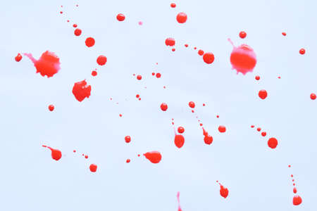 Blood splatters. Abstract splatter red color on white backgroundの写真素材