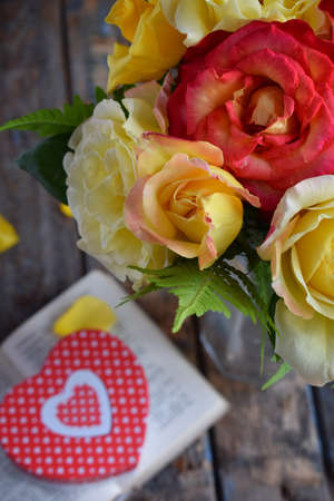 Bouquet of yellow and red roses. Flowers. Valentine or Wedding Theme. Romantic. Copy space.の写真素材